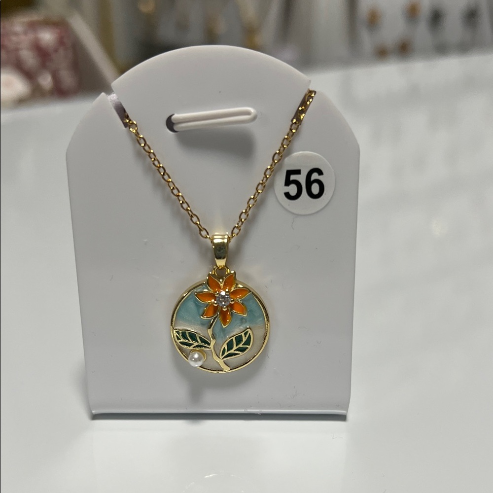 Elegant Gold and Orange Floral Pendant Necklace